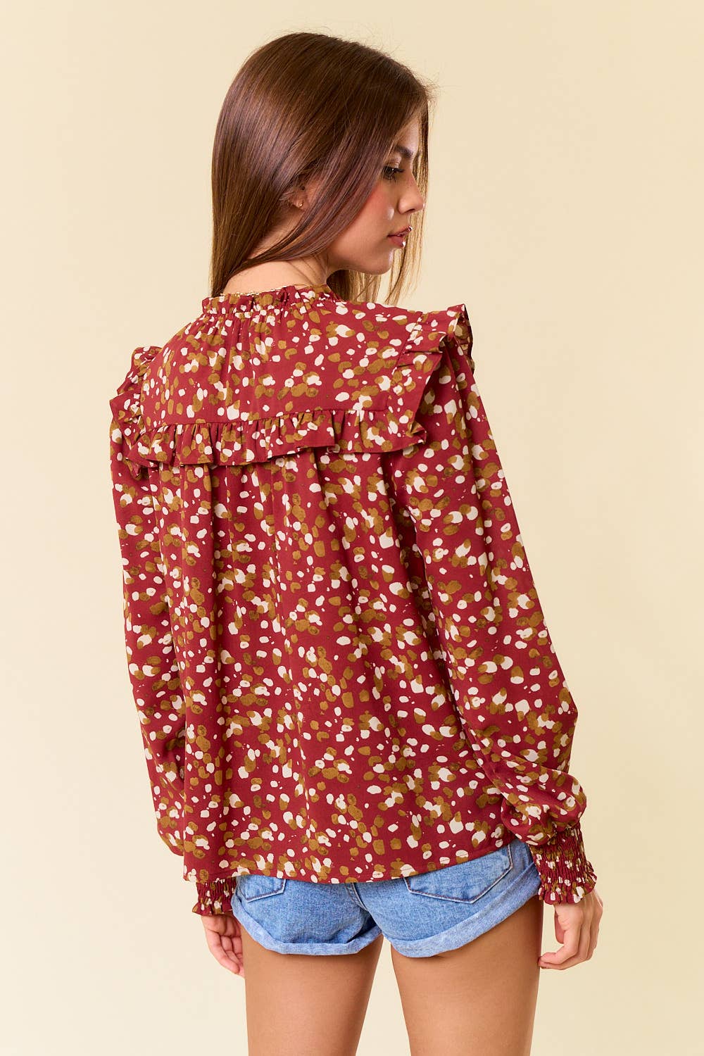 Abstract V-Neck Smocked Cuff Long Sleeve Blouse