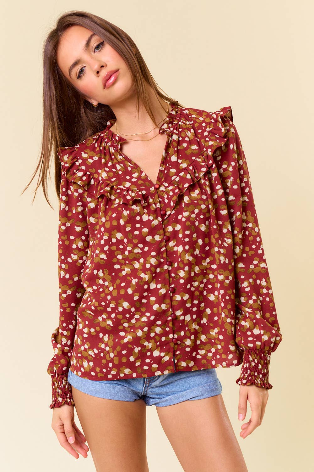 Abstract V-Neck Smocked Cuff Long Sleeve Blouse